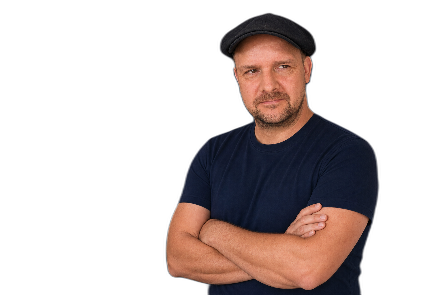 Karsten Samaschke standing attentively with his arms loosely folded
